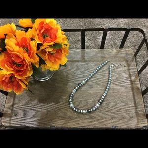 Beautiful strand faux pearls with cz accents.